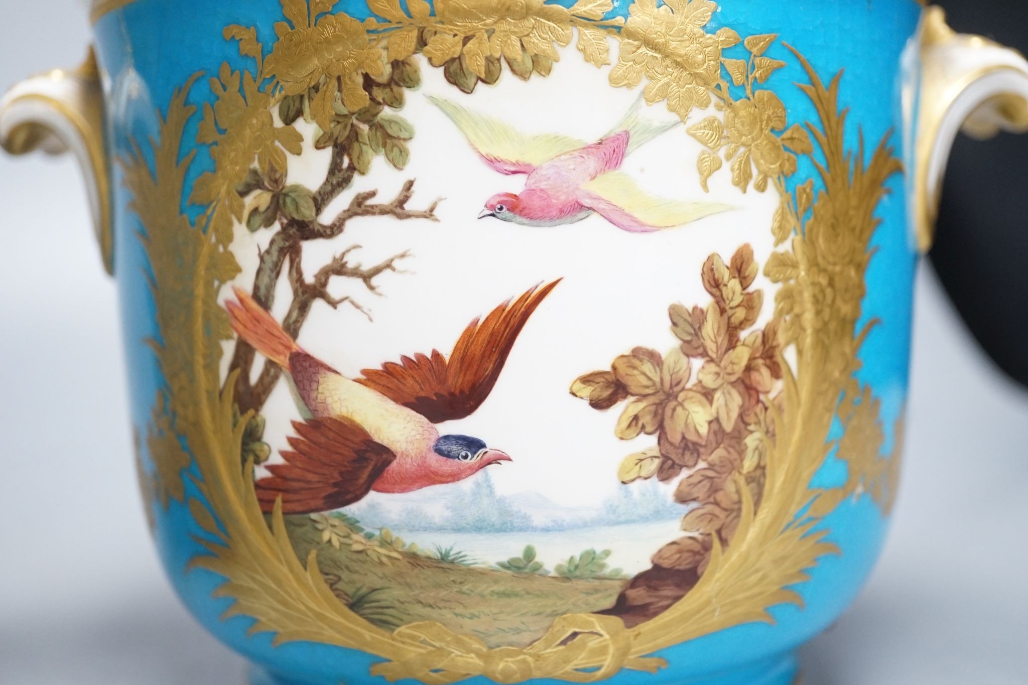 A pair of mid 19th century English porcelain cache pots, 14.5 cms high.